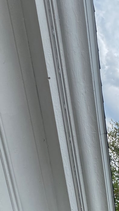 Low-profile permanent outdoor lighting installed discreetly along a home roofline Low-profile permanent outdoor lighting installed discreetly along a home roofline