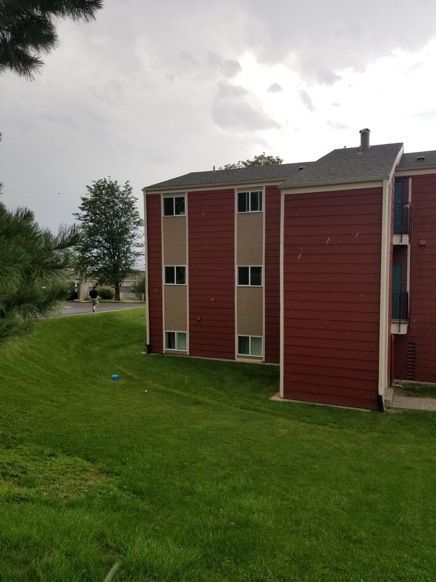 Multifamily property after exterior painting and window improvements