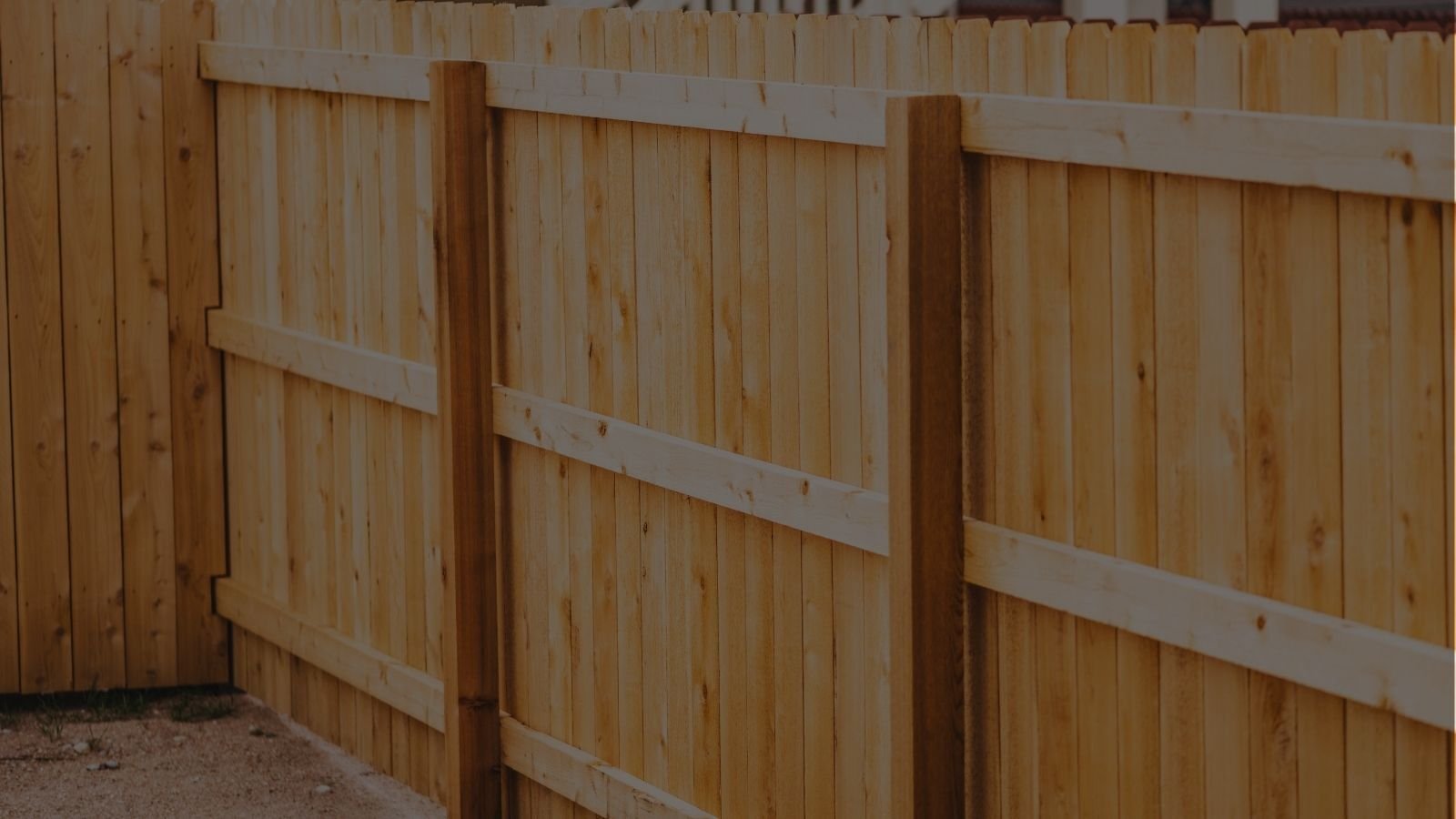 Wood privacy fence installation on a residential property in Parker