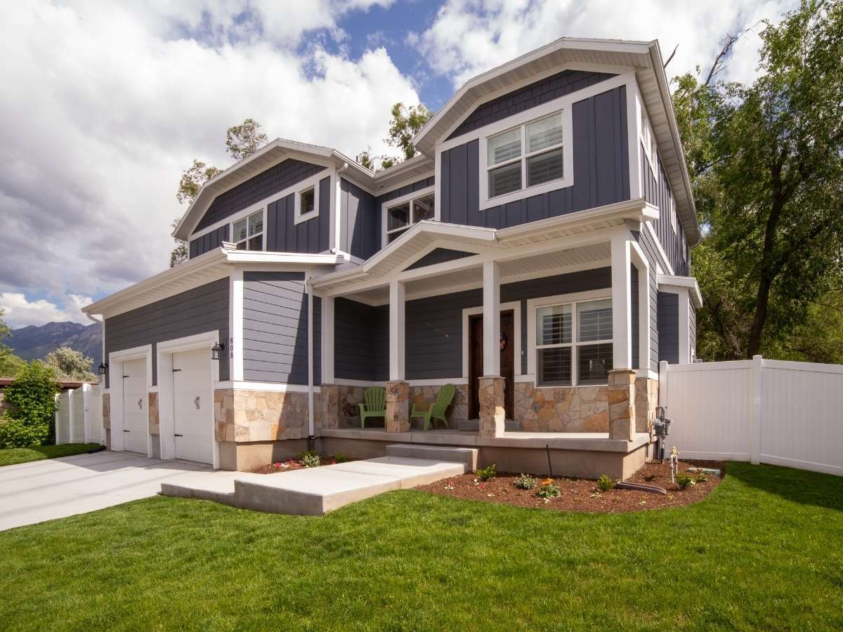 Updated home exterior with siding, windows, doors and coordinated exterior improvements