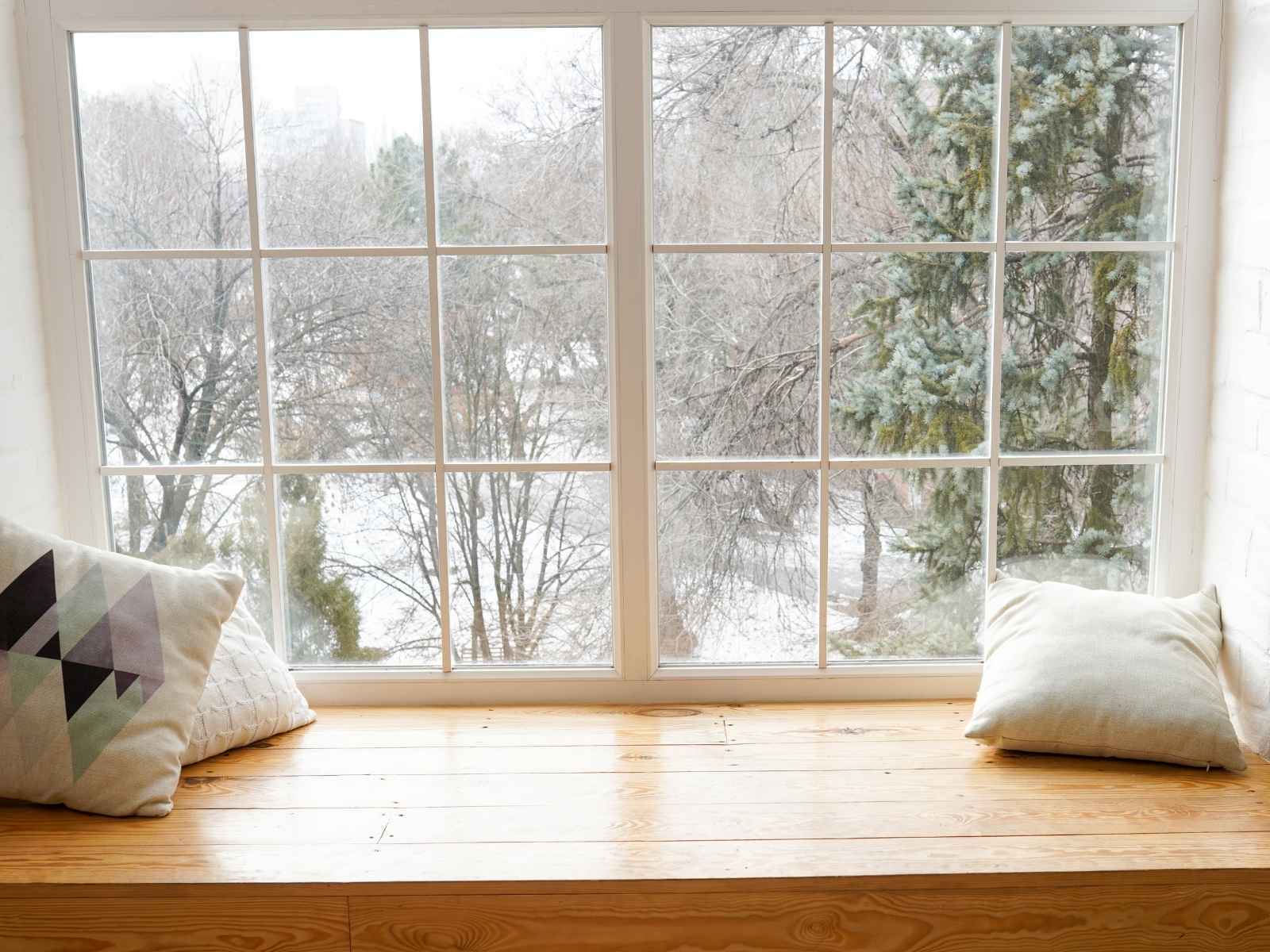 Replacement window overlooking a winter landscape Replacement window overlooking a winter landscape
